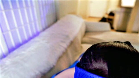 BuniBun MILF in blue headband sitting on couch from behind