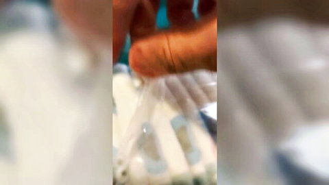 Hand opening Pampers Baby-Dry size 7 diaper box, ABDL fetish tease