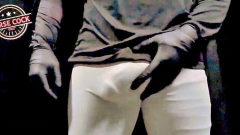 Man in black gloves teasing bulge in tight white pants solo tease