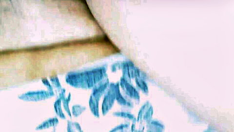 Blurry tangled white bedsheets with blue floral pattern after steamy Indian wife fuck
