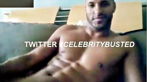 Muscular black stud lounging shirtless on couch flashing his hard erect cock and ripped abs