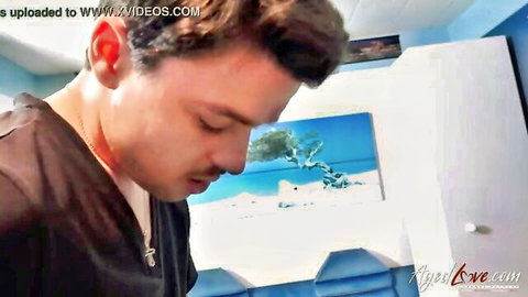 Closeup of handsome man intently licking pussy in bedroom