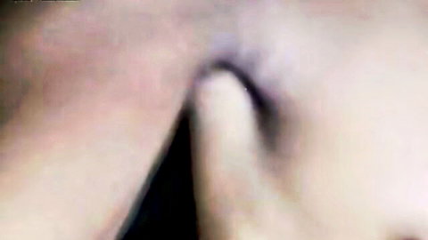 Skinny brunette rubs and shaves her shaved pussy closeup