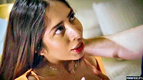 Brunette beauty with open mouth and tongue out as man grips her throat roughly from behind
