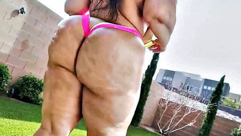 BBW brunette twerks her massive fat ass in tiny pink thong outdoors