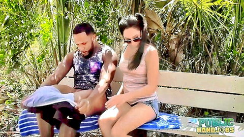 Rachel Rose gives public handjob to black cock in park