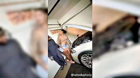 Tatted up Holly in shorts bending near white car in garage
