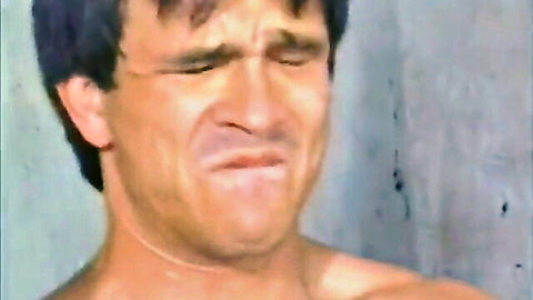 Muscular guy grimacing during intense shemale anal scene