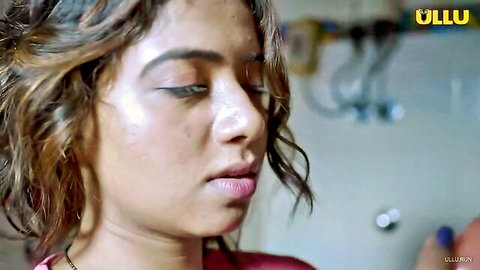 Seductive Indian MILF close-up with wet hair and red top