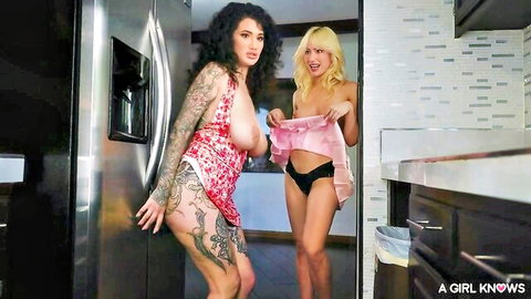 Ivy Wolfe and tattooed brunette topless tease in lingerie