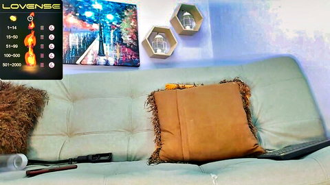 Cozy webcam room setup with Lovense toys neon sign, green couch, pillows for hot gay cam shows