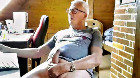 Older bald man stroking erect big cock in solo gay masturbation video