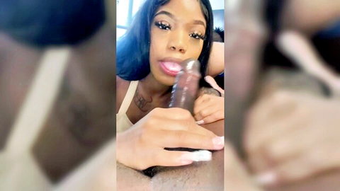 Ebony beauty with long hair giving sloppy blowjob in Houston thot party