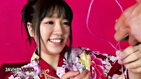 Chiharu smiles in kimono near cock for JAV blowjob tease