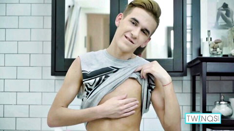 Skinny blonde college boy William lifts shirt exposing chest in shower