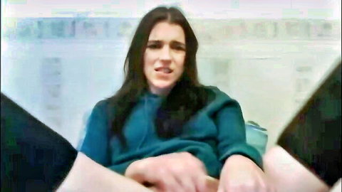 Brunette in teal hoodie spreads legs wide as hands grip inner thighs teasing pussy