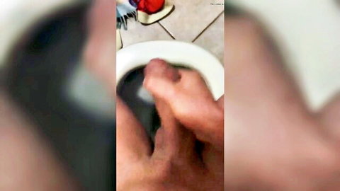 Blurry hand in toilet bowl from straight cum amateur video