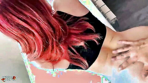 Redhead in jeans with hands gripping her waist in amateur home sex scene