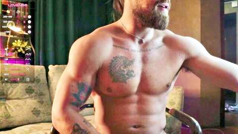 Karlos Murphy muscular bearded gay cam model flexing tattoos