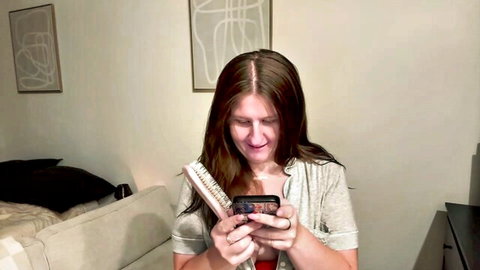 Chloejaxxx smiling with big tits cleavage in open cardigan, Chaturbate cam tease