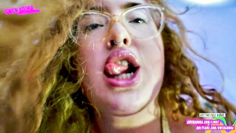 BBW giantess with curly hair and glasses sticks out tongue in vore POV fetish