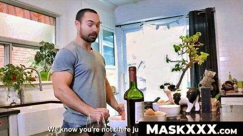Muscular hunk in gray tee holds wine bottle after cooking, teasing solo wank session
