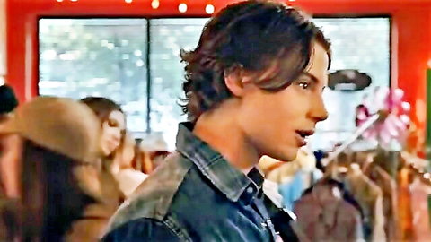 Young actor Zach from My Life with the Walter Boys in denim jacket, sideways glance