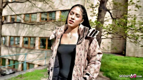 Helen Star in German Scout casting, curvy pose outdoors in patterned jacket