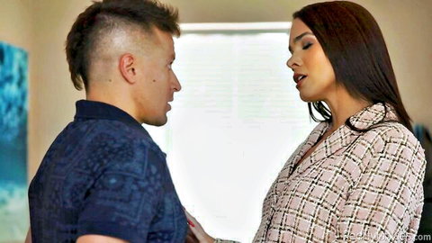 Seductive Latina MILF in blazer leans in for intimate kiss with mohawked stud