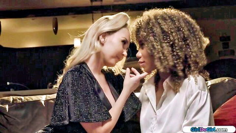 Blonde seduces curly-haired ebony in intimate lesbian first-time tease