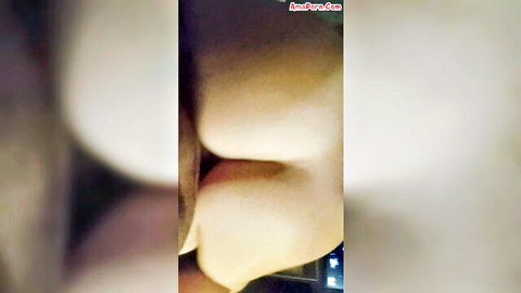 Blurry close-up of pale amateur model's curvy buttocks