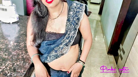 YourPinki in sexy blue saree, showing deep cleavage and curvy midriff
