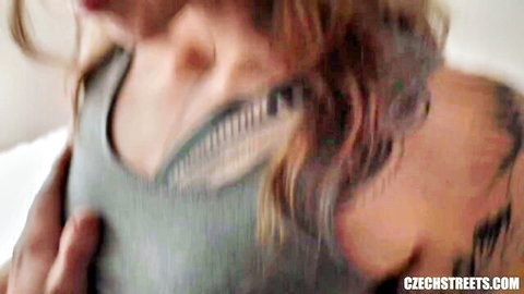 Czech Streets amateur redhead in gray tank top, man's hand on shoulder closeup