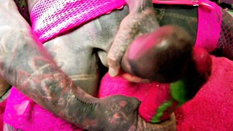 Tattooed trans with flaccid cock gets tight asshole stretched by huge pink dildo solo anal masturbation.