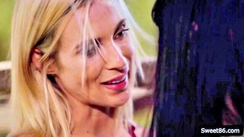 Aiden Ashley smiles seductively in outdoor lesbian scene with Annie Charlotte