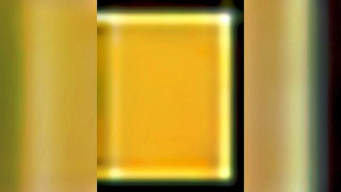 Glowing yellow frame on black background, empty placeholder for adult video thumbnail