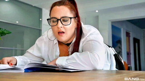 Clothed MILF Sabina Black in glasses and white blouse reading book