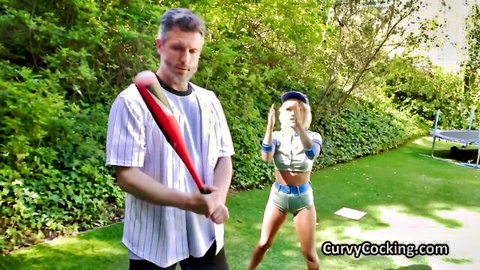 Curvy babe in tight baseball outfit poses with stud holding bat outdoors