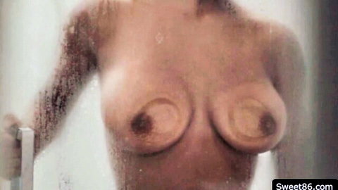 Steamy shower nude with Dana DeArmond's bare breasts visible