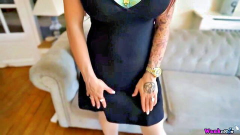 Busty redhead MILF Jennifer Keelings in sexy black dress posing seductively