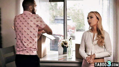 Blonde in white cardigan eyes black man with box, teasing interracial setup