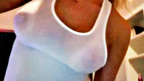 Blonde Luna in see-through white tank top showing big tits