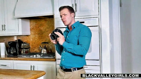 Noemie Bilas with fit Caucasian photographer in kitchen shoot