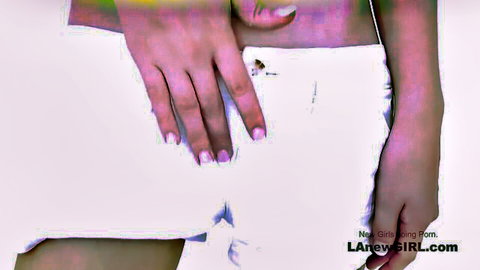Hands gripping petite girl's hips over tight white shorts teasing her curves