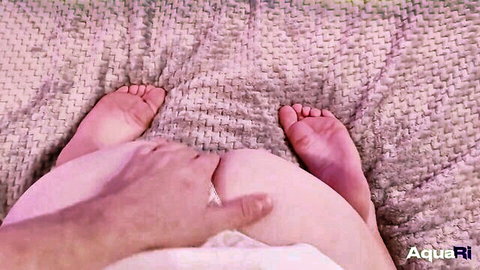 Close-up POV of woman's exposed pussy being fingered by hand