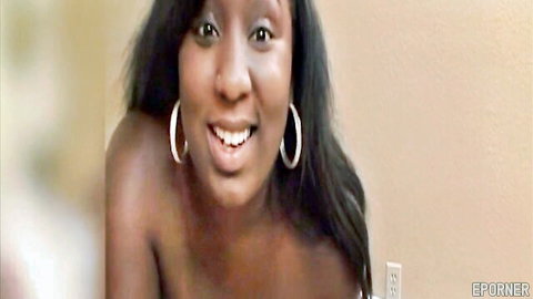 Smiling black BBW topless with hoop earrings in amateur threesome