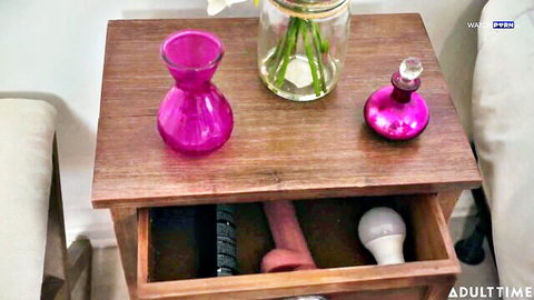Lilith Grace's teasing phone check setup with pink dildo toy
