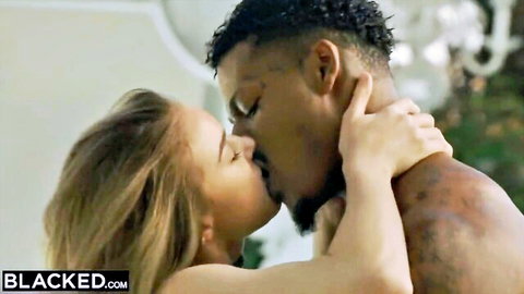 Blonde with perky tits passionately kissing muscular black stud in intense interracial embrace