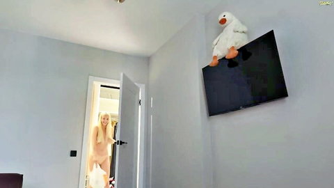 Busty blonde lesi_moonie teasing in sheer top doorway