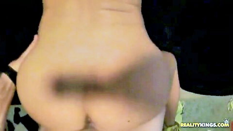 Blonde with big ass bent over, tattooed lower back, man gripping hips in doggy style